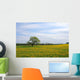 Oak tree on the Dandelion field Wall Mural