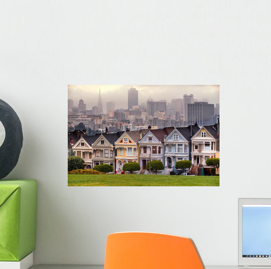 The Painted Ladies of San Francisco, California sit glowing amid Wall Mural