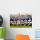 The Painted Ladies of San Francisco, California sit glowing amid Wall Mural