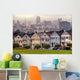 The Painted Ladies of San Francisco, California sit glowing amid Wall Mural