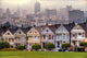The Painted Ladies of San Francisco, California sit glowing amid Wall Mural