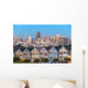 The Painted Ladies of San Francisco, California sit glowing amid Wall Mural