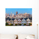 The Painted Ladies of San Francisco, California sit glowing amid Wall Mural