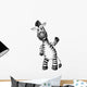 A smiling zebra standing 