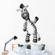 A smiling zebra standing 