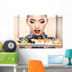 Beautiful young woman eating sushi. Shallow depth of field, focu 