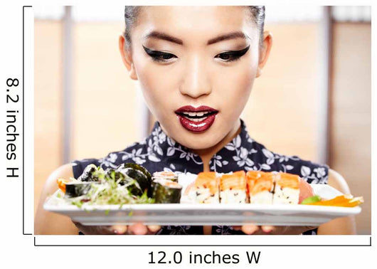 Beautiful young woman eating sushi. Shallow depth of field, focu 
