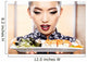 Beautiful young woman eating sushi. Shallow depth of field, focu 