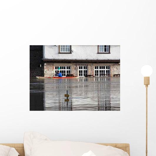 Canoeist Paddles past Flooded Wall Decal