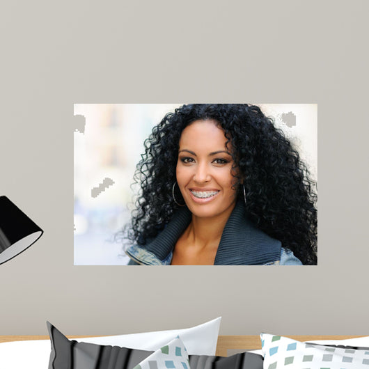 Young black woman smiling with braces 