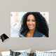 Young black woman smiling with braces 