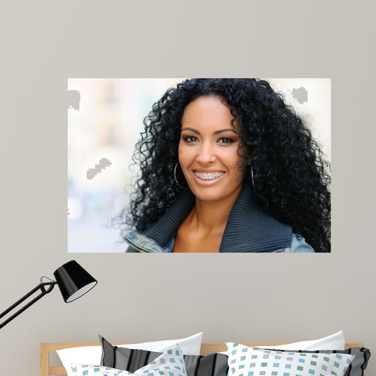 Young black woman smiling with braces 