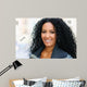 Young black woman smiling with braces 