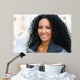 Young black woman smiling with braces 