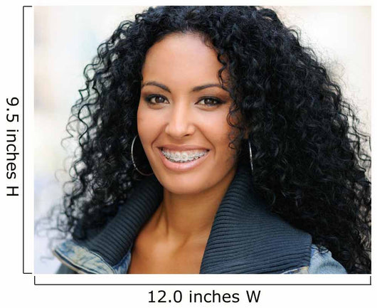 Young black woman smiling with braces 