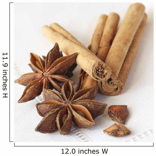 Star anise and cinnamon sticks, on a beige linen napkin. Wall Mural