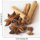 Star anise and cinnamon sticks, on a beige linen napkin. Wall Mural