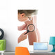 Dermatologist examines a mole Wall Mural