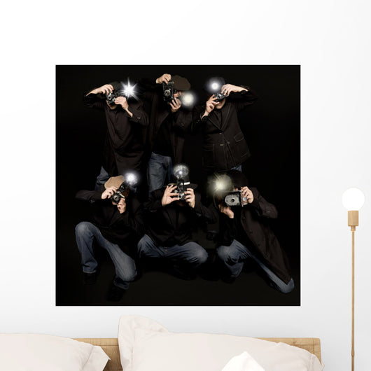 Retro style paparazzi press photographers with vintage cameras Wall Mural
