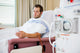 Patient Using Mobile Phone Dialysis Wall Decal