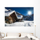 winter ski chalet and cabin in snow mountain  landscape in tyrol 