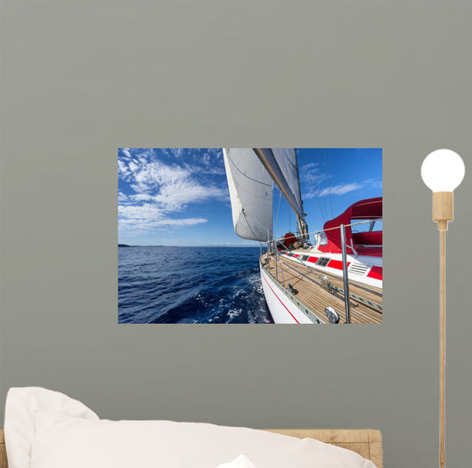 Sailing yacht in blue sea 