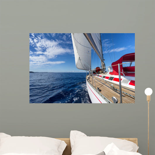 Sailing yacht in blue sea 