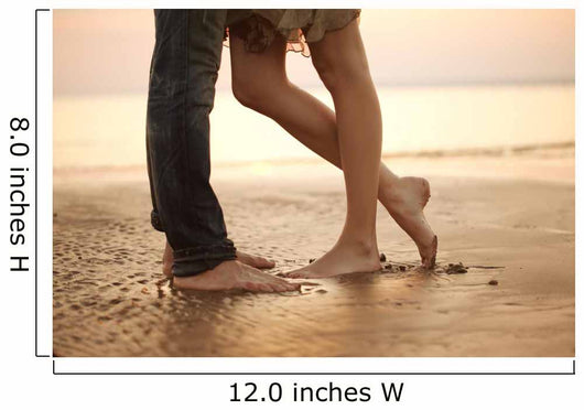 A loving young couple hugging and kissing on the beach. Lovers m Wall Mural