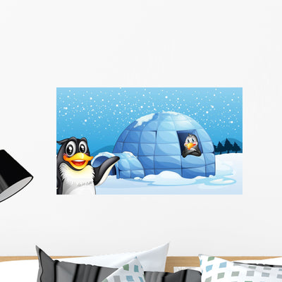 Penguins and Igloo Wall Mural shown on a wall