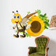 A smiling yellow bee near the beehive Wall Decal