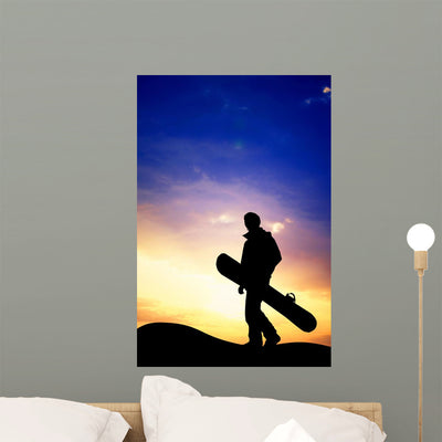 Snowboarder Sunset Wall Mural shown on a wall