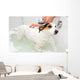 Dog Taking a Bath in a Bathtub 