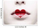 Close up of female lips with red heart shape painted on it 