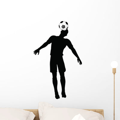 Head Strike Soccer Player Wall Decal shown on a wall