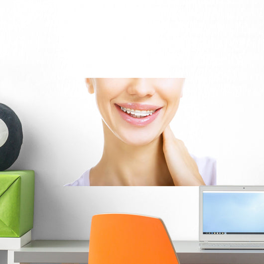 Beautiful smiling girl with retainer for teeth Wall Mural