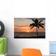 Sunset with single palm Wall Mural