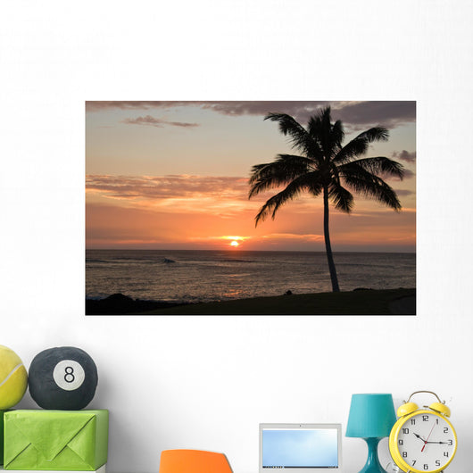 Sunset with single palm Wall Mural