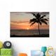 Sunset with single palm Wall Mural