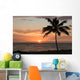 Sunset with single palm Wall Mural