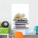 bücherstapel with open book 