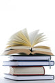 bücherstapel with open book 