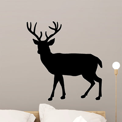Deer Silhouette shown on a wall