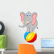 elephant cartoon standing on a ball Wall Decal