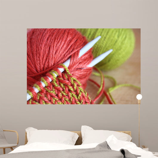 Wool and knitting needles closeup. 