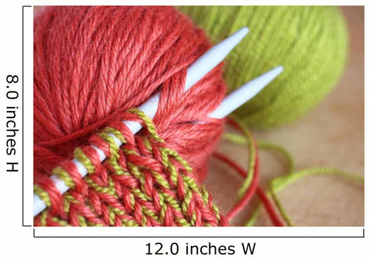 Wool and knitting needles closeup. 