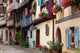 Street with half-timbered medieval houses in Eguisheim 