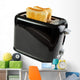 Black toaster with bread slices , isolated on white 