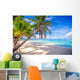 Coconut Palm tree on the white sandy beach Wall Mural