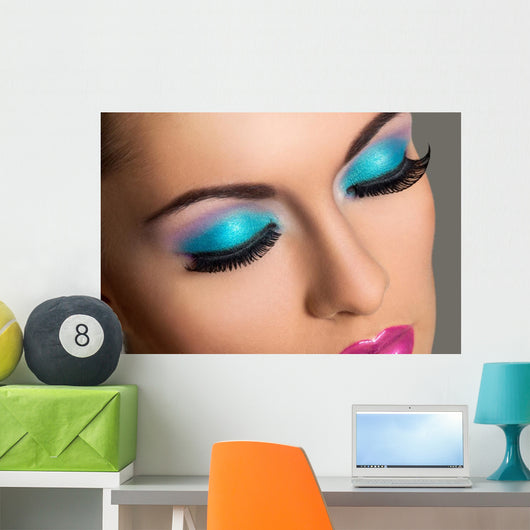 Beautiful girl with colorful makeup 