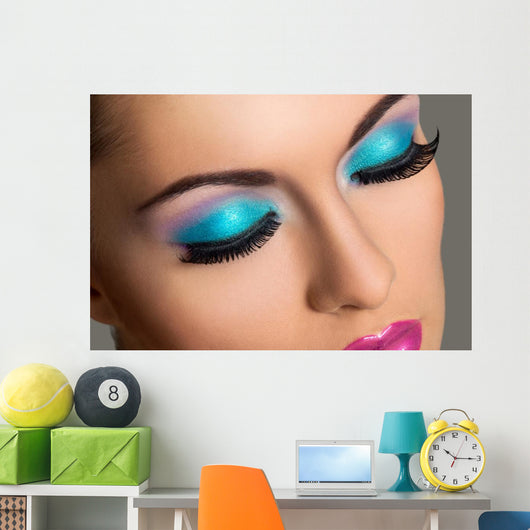 Beautiful girl with colorful makeup 